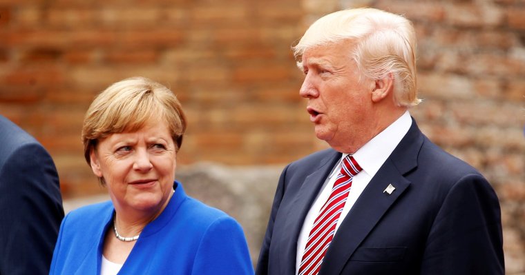 Canadian PM Trudeau, German Chancellor Merkel, U.S. President Trump and Italian PM Gentiloni pose for a family photo at the start of G7 Summit at Greek Theatre in Taormina